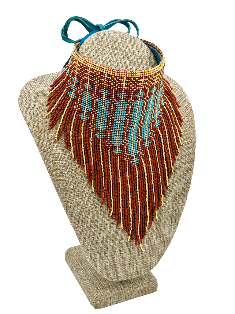 Terra cotta, gold & turquoise bandana, glass beads, nylon thread, finished with turquoise backing and turquoise deerskin ties